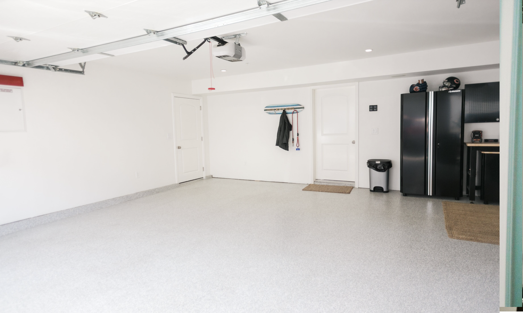 Three-car garage with two open spots